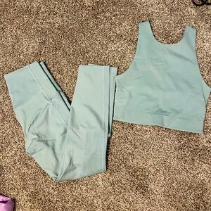 Girlfriend Collective sea foam green cropped bra top and pocket leggings set